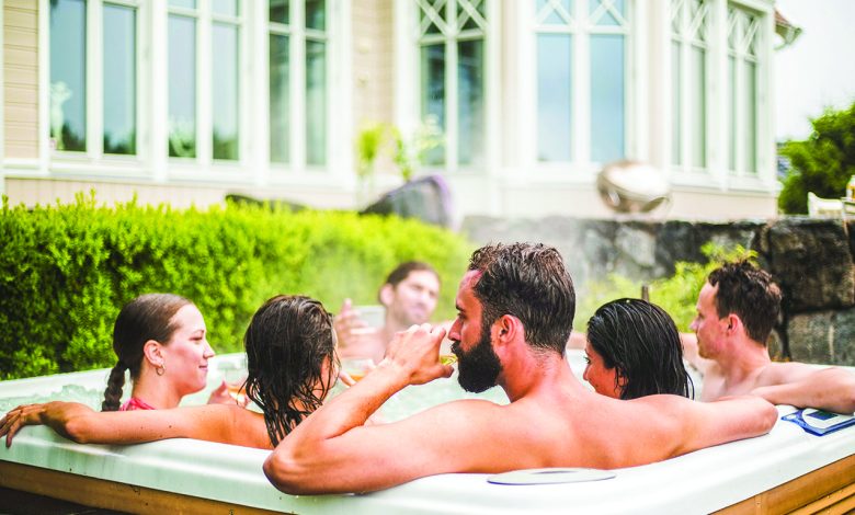 People relaxing in a hot tub - Durham Trade Shows provides home decor ideas!