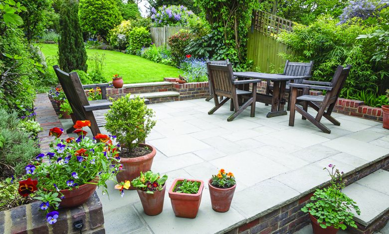 A beautiful backyard patio arranged with decor ideas from home shows in Durham.